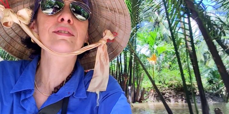 Vietnam Passeio de barco pelo Rio Mekong Claudia Tonaco